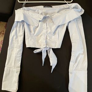 Light blue off the shoulder button up-like crop blouse with tie in front or back